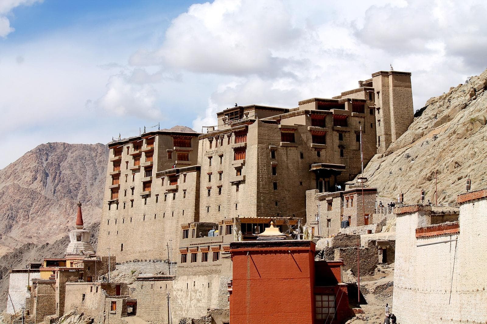 Leh Palace, storeys of stone and wood, on the rocky hill above the town.