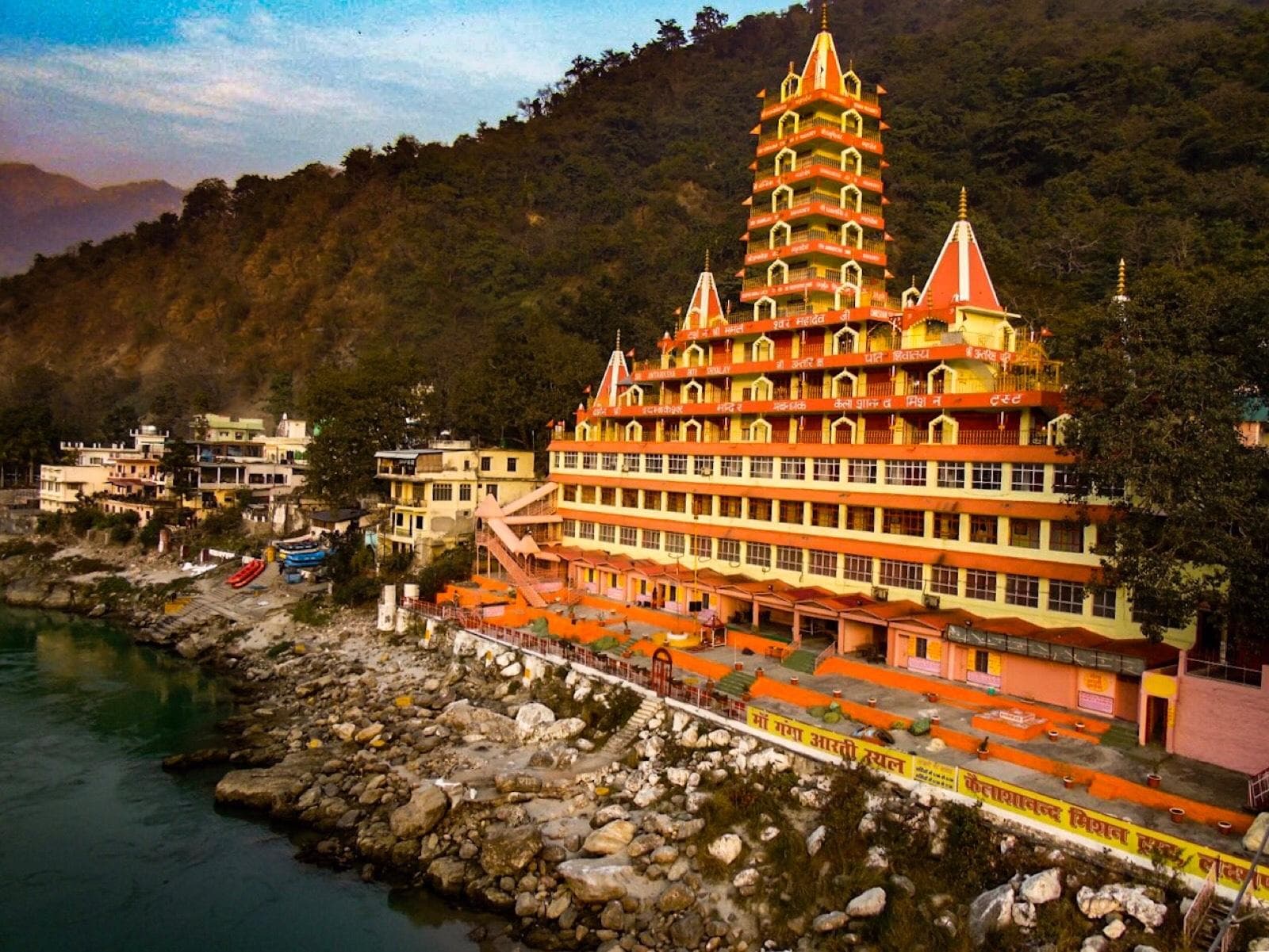 The thirteen-storey Trayambakeshwar temple beside the Ganga near Laxman Jhula.